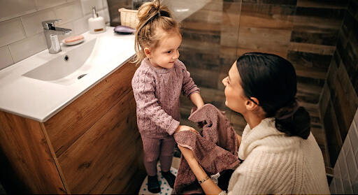 Mother and daughter in the bathroom